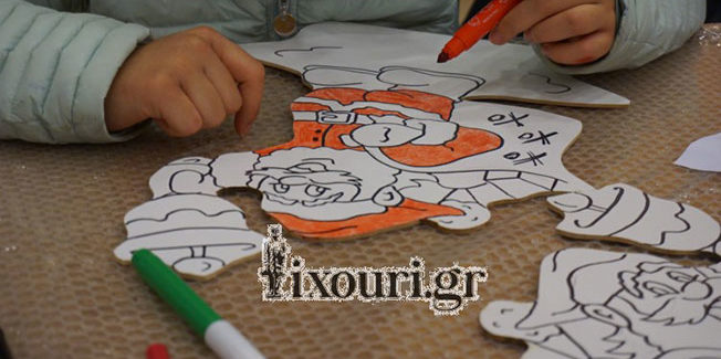 Στην  Ιακωβάτειο Βιβλιοθήκη, για να ζωγραφίσουν τον Άγιο Βασίλη.